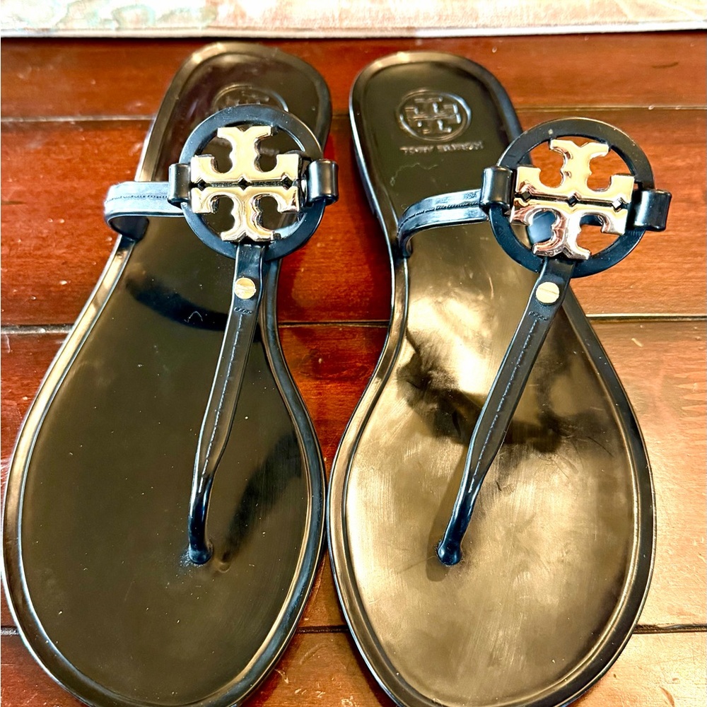 Tory Burch Black Jelly Sandals with Gold Logo Medallion